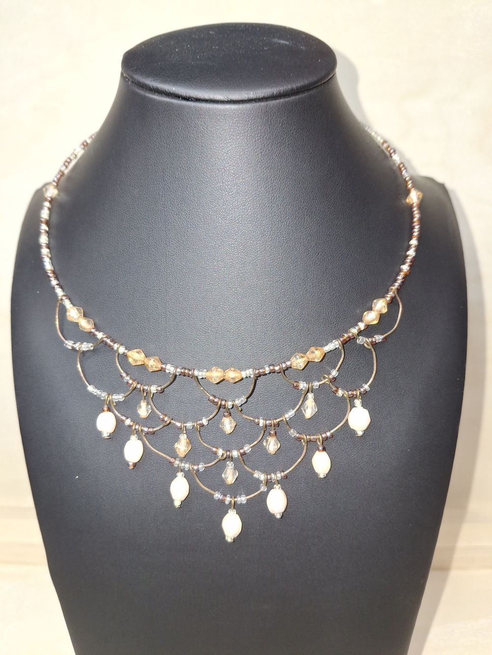 Elegant Multi-Tier Beaded Necklace in Gold and Pearl Tones